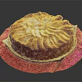 Round Cake Topped With Sliced Pears On Pink Patterned Cloth