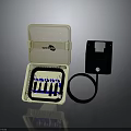 Clear Cover Connection Box Containing Blue Components With Black Square Device And Ring