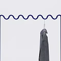 Modern Metal Clothing Rack With Wavy Top Circular Base And Gray Garment Hanging