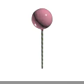 Sweet Pink Lollipop with Green Striped Stick on Black Background