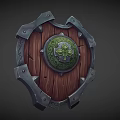 Intricate Decorative Wooden Shield With Metal Edges And Green Floral Emblem