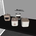 Beige And White Kitchen Appliances On Dark Countertop With Minotli Logo