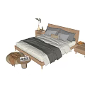 Modern Wooden Double Bed With Gray Blanket Multiple Pillows Nightstands And Woven Ottoman