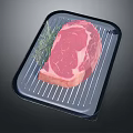 Fresh Raw Ribeye Steak on Black Baking Tray with Rosemary Garnish