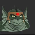 Mythical Creature Character With Green Skin Helmet Red Gem Yellow Eyes And Sharp Fangs