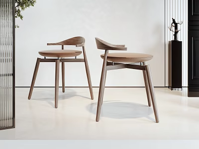 Modern Wooden Dining Chairs With Curved Backrest And Slim Legs In Minimalist Interior 3d model