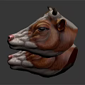 Two Brown And White Cow Head Models With Pink Noses And Big Ears