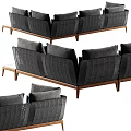 Gray Sectional Sofa With Blue Pillows Throw Blanket And Wooden Legs