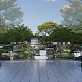 Rockery Stones In Modern Garden With Green Trees Lawn And White Stone Path