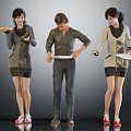Group of Three People Holding Plates Wearing Casual Sweaters And Dresses