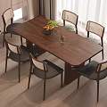 Modern Wooden Dining Table With Mesh Back Chairs And Fruit Bowl Green Plant Vase