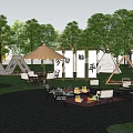 Scenic Campsite With White Sail Shade Surrounded By Trees Glamping Tents And Outdoor Dining Furniture