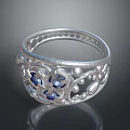 Exquisite Silver Ring Featuring Detailed Filigree Patterns Blue Gemstones And Beaded Edges