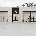 Modern Clothing Store Showroom With Elegant Interior Display Racks Sofa Seating And Large Windows