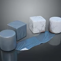 Cylindrical and Cubical Shapes with Textured Surfaces and Blue Fabric