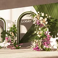 Elegant Floral Installation With Green Arched Structures Large Tropical Leaves And Pink White Blooms