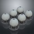 Six White Spherical Water Tanks With Metal Support Structures On Gray Background