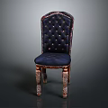 Luxurious Tufted Chair With Deep Blue Upholstery And Ornate Carved Wooden Legs