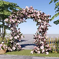 Commercial Equipment Pink Flower Arch With Green Trees Stone Path Flower Basket And Wooden Fence