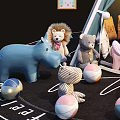 Stuffed Animals Around Blue Teepee Tent With Star Moon Patterns Alphabet Mat And Decorative