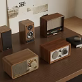 Vintage Style Wooden Audio Devices Including Speakers And Radios On Table