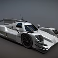 Silver Prototype Racing Car With Streamlined Body Rear Wing And Sporty Design
