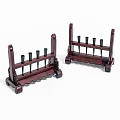 Two Brown Wooden Tool Holders With Black Pegs And Scalloped Base