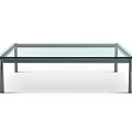 Modern Coffee Table With Clear Glass Top And Sleek Metal Frame Design