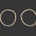 Detailed Artistic Circular Sculpture Carvings With Intricate Silver Decorative Patterns