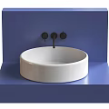 Stylish Round White Washbasin with Black Knobs on Blue Countertop 3d model
