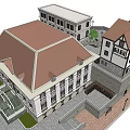 Traditional European Architecture Featuring Red Brown Roofs White Walls Courtyard Stone Paths and Trees