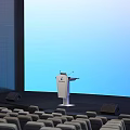Modern Conference Hall Interior With Podium Blue Background Screen And Rows Of Seats