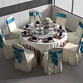 Round Dining Table With Beige Chairs Blue Bows White Tablecloth Tableware Vase And Candle Holders