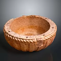 Sculpted Clay Bowl With Intricate Rope Pattern Carving And Textured Surface