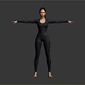 Woman in Black Bodysuit with Arms Outstretched Standing Barefoot Against Gray Background