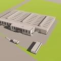 Large Industrial Factory Building With Green Trees Lawns Roads And Parking Areas