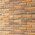 Brick Background Wall Featuring Warm Tones Neatly Arranged Textured Bricks for Interior Decor