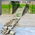 Stone Gate Structure With Moss Covered Walls Stone Steps And Broken Wooden Planks