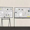 Two Whiteboards With Stands Holding Notes Papers And Various Stickers