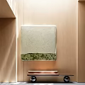 Textured Oil Painting With Light Background Green Bottom on Wooden Wall With Stacked Books Below