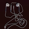 Modern White Wired Earphones Featuring Ergonomic Earbuds And Tangled Cable Design