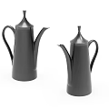 Two Black Metal Coffee Pots With Sleek Design Handle Spout And Lid On White Background