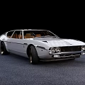 Classic Silver Sports Car With Sleek Design And Black Alloy Wheels