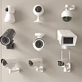 Various Projection Monitoring Cameras Mounted On Wall With Different Designs And Styles