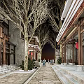 Traditional Commercial Street Landscape With Ancient Architecture Stone Pavement Trees And Pedestrians