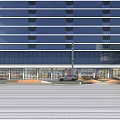 Modern Commercial Street With Glass Curtain Walls Ground Floor Shops And Parked Car