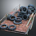 Used Automotive Car Tires Stacked On Metal Pallet With Dry Leaves