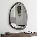 Modern Oval Mirror With Black Frame Reflecting Living Room Sofa Curtains And Lamp