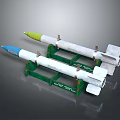 Two Military Missiles With Blue And Green Tips On Green Stands