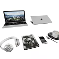 Apple Silver Laptops Open and Closed with Headphones Smartphone Coffee Cup and Book